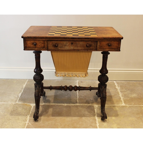 572 - A Victorian burr walnut sewing and games table combined, the rectangular top centred with an inlaid ... 