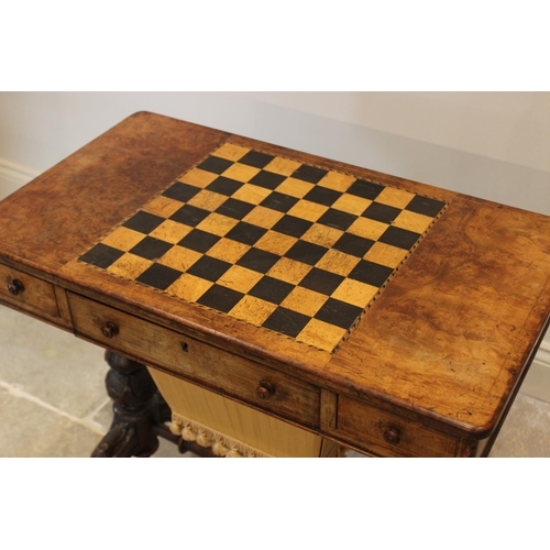 572 - A Victorian burr walnut sewing and games table combined, the rectangular top centred with an inlaid ... 