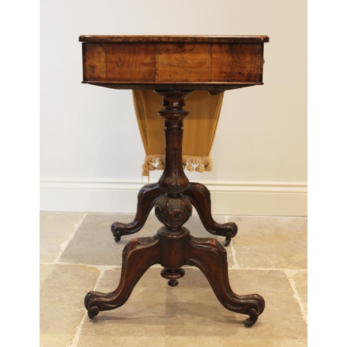 572 - A Victorian burr walnut sewing and games table combined, the rectangular top centred with an inlaid ... 