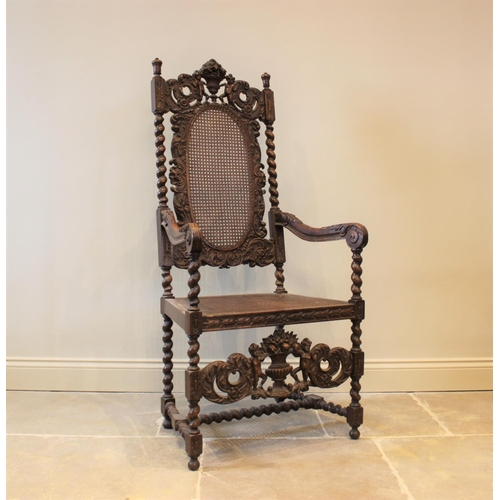 581 - A 19th century Carolean style carver chair, carved with floral bouquets flanked by cherubs, with ber... 