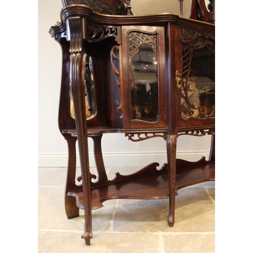 582 - A late Victorian mahogany mirror back chiffoniere, of serpentine form with an oval mirror back above... 