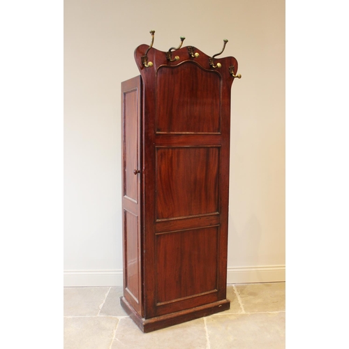 589 - A mid 19th century mahogany leaf store, combined with a hall stand, the serpentine side panel mounte... 