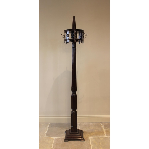 592 - A 19th century mahogany hat stand, the leaf carved and reeded column raised upon a square stepped pl... 