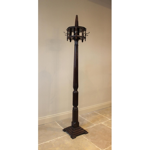 592 - A 19th century mahogany hat stand, the leaf carved and reeded column raised upon a square stepped pl... 