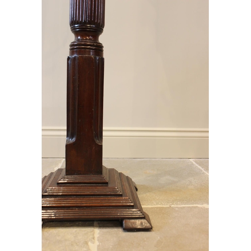 592 - A 19th century mahogany hat stand, the leaf carved and reeded column raised upon a square stepped pl... 