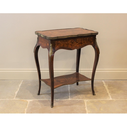 595 - A French Louis XVI style kingwood vanity table, the serpentine rectangular top with marquetry and pa... 