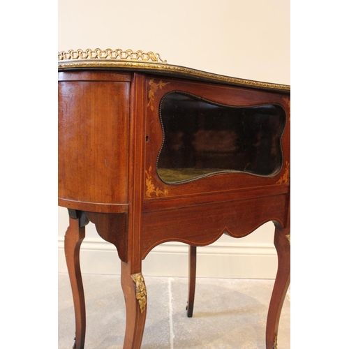 596 - A French Louis XVI style bijouterie cabinet, of kidney-shape, with a glazed cupboard door and marque... 