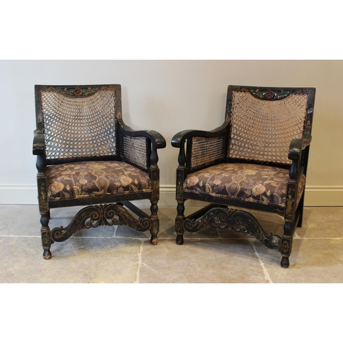 621 - A pair of early 20th century chinoiserie bergere armchairs, the rattan back above a sprung seat encl... 