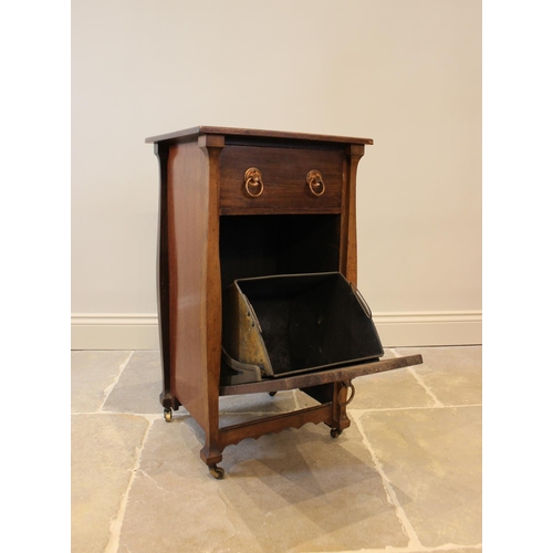 624 - An early 20th century Art Nouveau mahogany coal purdonium, the rectangular top above a single drawer... 