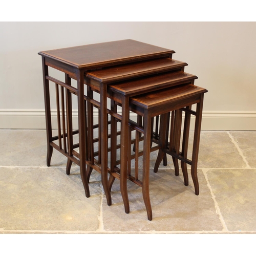 630 - An Edwardian mahogany and satinwood cross banded quartetto nest of tables, each table with a rectang... 