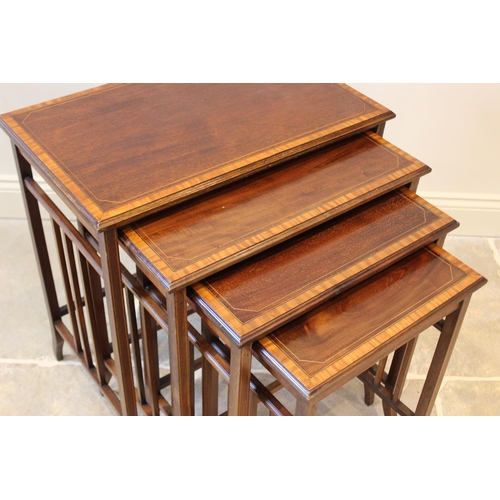 630 - An Edwardian mahogany and satinwood cross banded quartetto nest of tables, each table with a rectang... 