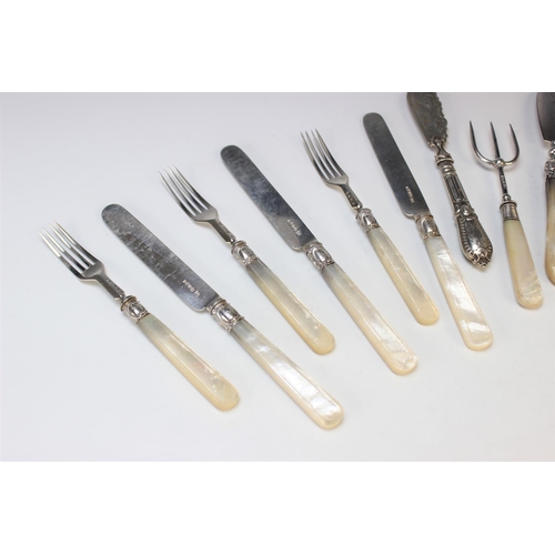 65 - A set of twelve silver and mother of pearl handled fruit knives and forks, John Gammage, Birmingham ... 