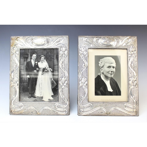 69 - A pair of Art Nouveau silver mounted photograph frames by J & R Griffin, Chester 1905, each of recta... 