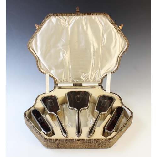 71 - An Art Deco silver mounted and tortoiseshell inlaid six-piece dressing table set by I S Greenberg & ... 