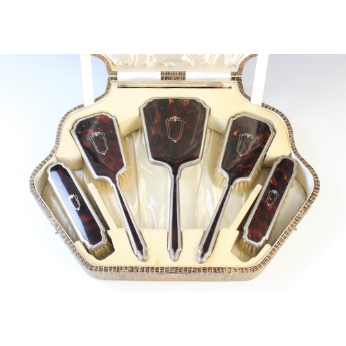 71 - An Art Deco silver mounted and tortoiseshell inlaid six-piece dressing table set by I S Greenberg & ... 