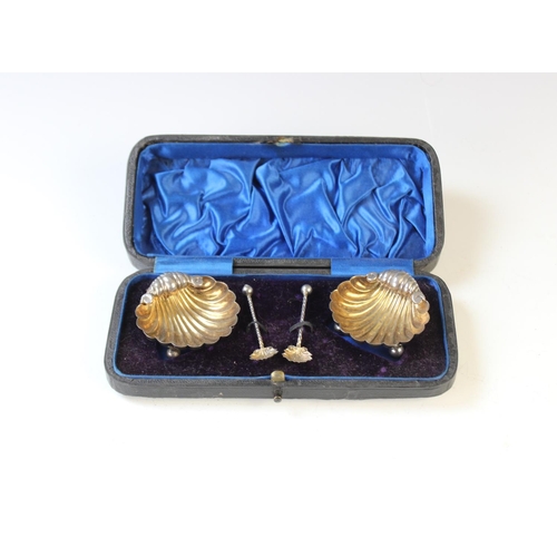 73 - A pair of Victorian silver open salts by James Deakin & Sons, Chester 1896, each of shell form with ... 