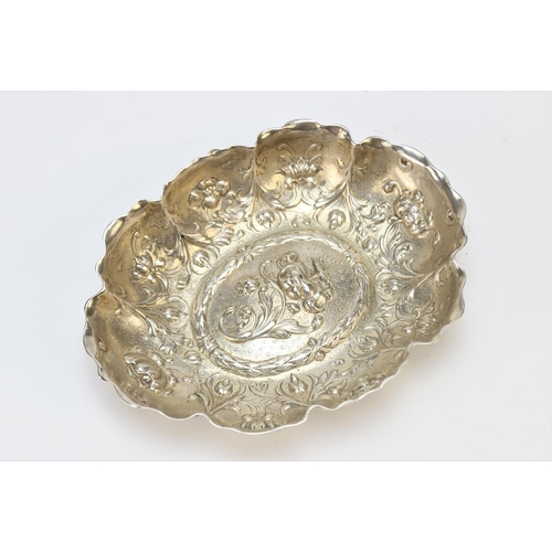 81 - A Victorian silver bon-bon dish William Comyns, London 1893, of oval form with scalloped border and ... 