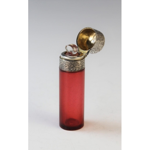 83 - A Victorian ruby glass and silver mounted scent bottle, possibly Birmingham 1892, (maker's mark worn... 