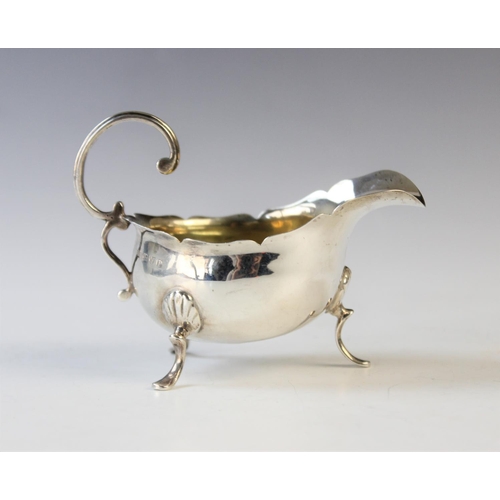 84 - A small Victorian silver sauce boat by George Nathan & Ridley Hayes, Chester 1898, of typical form w... 