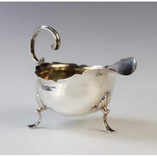 84 - A small Victorian silver sauce boat by George Nathan & Ridley Hayes, Chester 1898, of typical form w... 