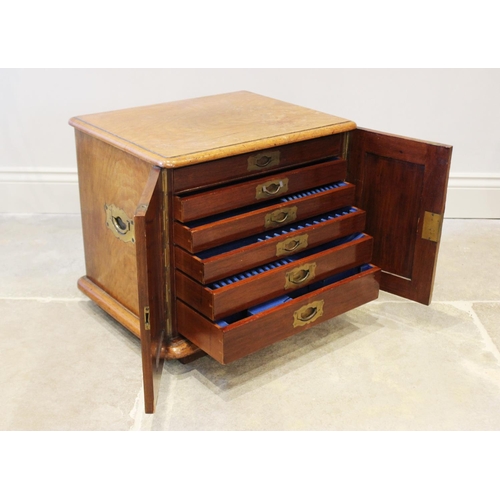 103 - A late Victorian oak cutlery canteen, the rectangular thumb moulded top above a pair of invert mould... 