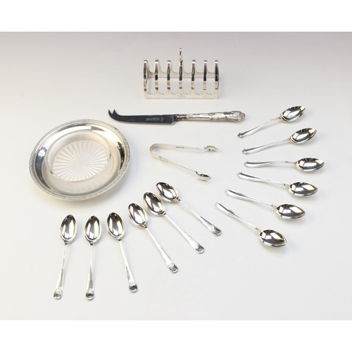 109 - A selection of silver tableware, to include; a George V six-division silver toast rack by Emile Vine... 