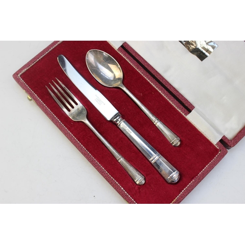 91 - A cased set of six silver sandwich skewers, each surmounted with a realistically modelled gilt cocke... 