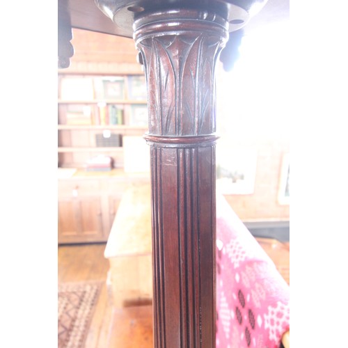 592 - A 19th century mahogany hat stand, the leaf carved and reeded column raised upon a square stepped pl... 