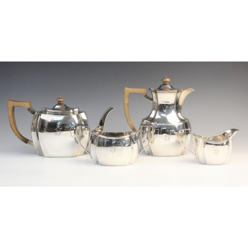 101 - A George V four-piece silver tea service by Thomas Bradbury & Sons, Sheffield 1928, comprising teapo... 