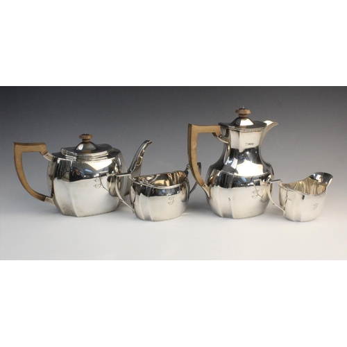 101 - A George V four-piece silver tea service by Thomas Bradbury & Sons, Sheffield 1928, comprising teapo... 