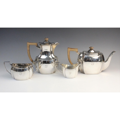 101 - A George V four-piece silver tea service by Thomas Bradbury & Sons, Sheffield 1928, comprising teapo... 