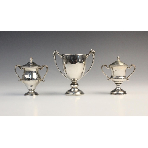 103 - A George V twin-handled silver trophy cup by F C Richards, Birmingham 1940, of typical form with kno... 