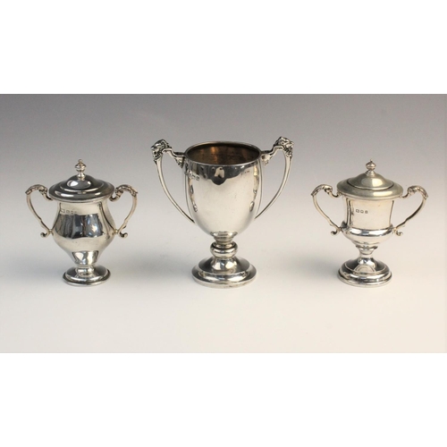 103 - A George V twin-handled silver trophy cup by F C Richards, Birmingham 1940, of typical form with kno... 