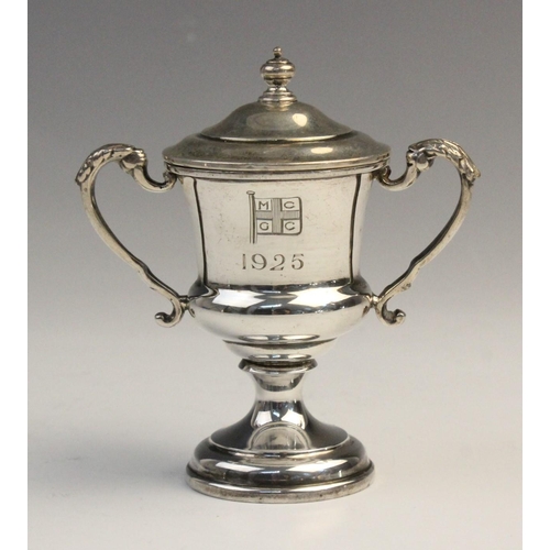 103 - A George V twin-handled silver trophy cup by F C Richards, Birmingham 1940, of typical form with kno... 