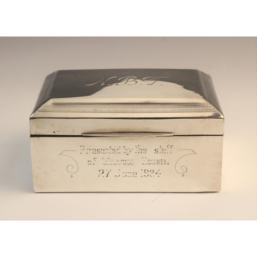 111 - A George V silver cigarette box by F H Adams & Co, Birmingham 1922, of rectangular form with engine ... 