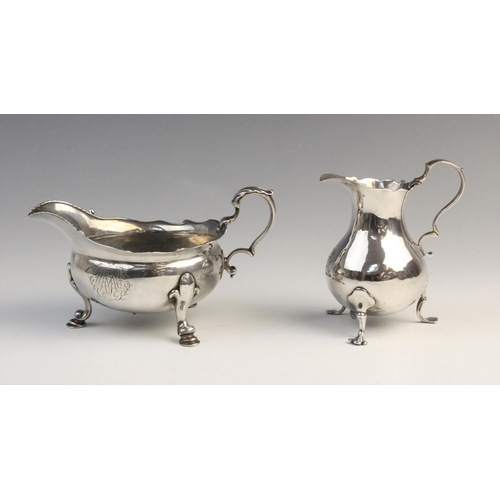 113 - A George II silver cream jug by Dorothy Mills & Thomas Sarbitt, London 1746, of baluster form with m... 