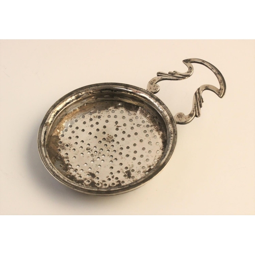 114 - A George III Scottish silver lemon strainer, (maker’s marks and date marks worn) of typical form wit... 