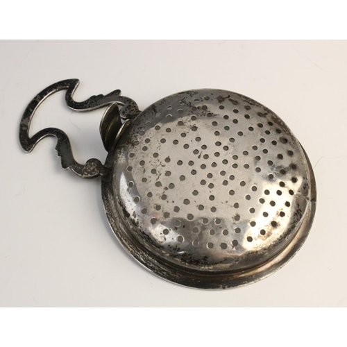 114 - A George III Scottish silver lemon strainer, (maker’s marks and date marks worn) of typical form wit... 