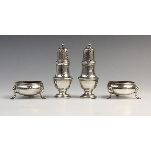 115 - A pair of George V silver pepperettes by Crichton Brothers, London 1933, each with reeded borders on... 