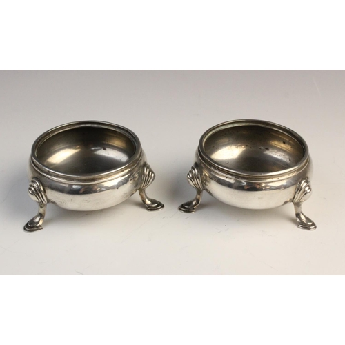 115 - A pair of George V silver pepperettes by Crichton Brothers, London 1933, each with reeded borders on... 