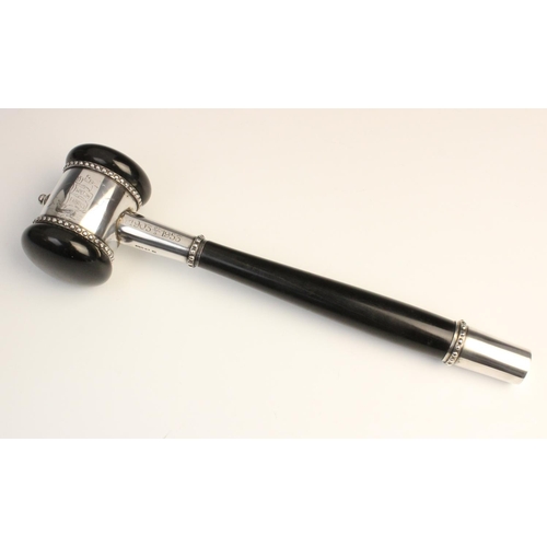 119 - A mid-twentieth century ebonised presentation gavel, plain polished with white metal mounts and bead... 