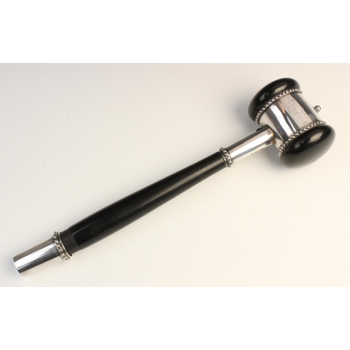 119 - A mid-twentieth century ebonised presentation gavel, plain polished with white metal mounts and bead... 