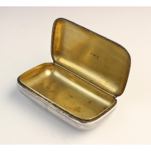 121 - A late 19th century Russian silver and niello snuff box, of rounded rectangular form decorated with ... 