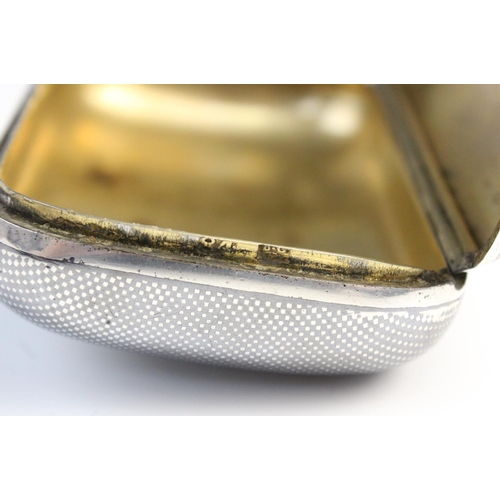 121 - A late 19th century Russian silver and niello snuff box, of rounded rectangular form decorated with ... 