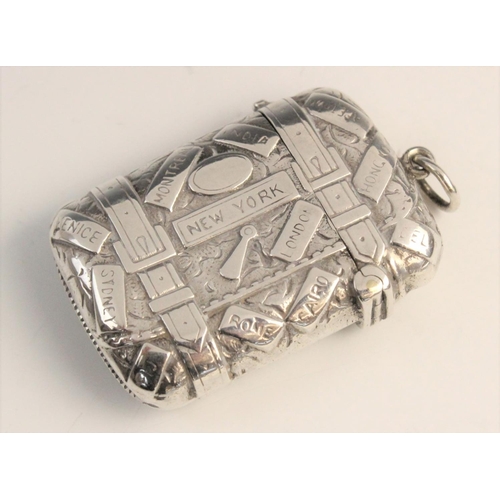 124 - A Victorian silver vesta case by Hilliard & Thomason, Birmingham 1889, designed as a travelling port... 