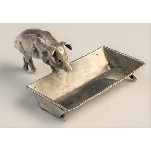 125 - A novelty silver open salt, Chester circa 1900, realistically modelled as a pig and trough, the trou... 