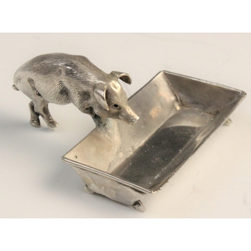 125 - A novelty silver open salt, Chester circa 1900, realistically modelled as a pig and trough, the trou... 