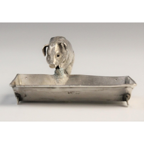 125 - A novelty silver open salt, Chester circa 1900, realistically modelled as a pig and trough, the trou... 