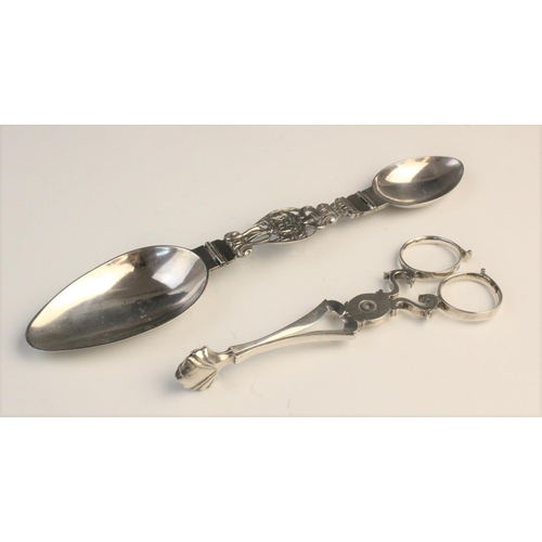 126 - A pair of eighteenth century silver sugar nips, circa 1750, 12.6cm long, together with a folding dou... 