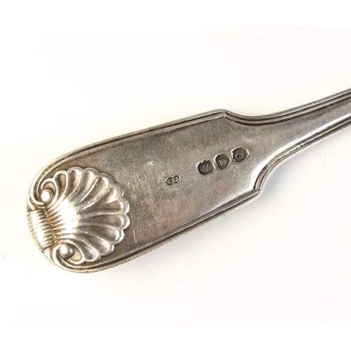 23 - A Victorian silver serving fork by Brewis & Co, London 1891, with fiddle thread and shell pattern ha... 